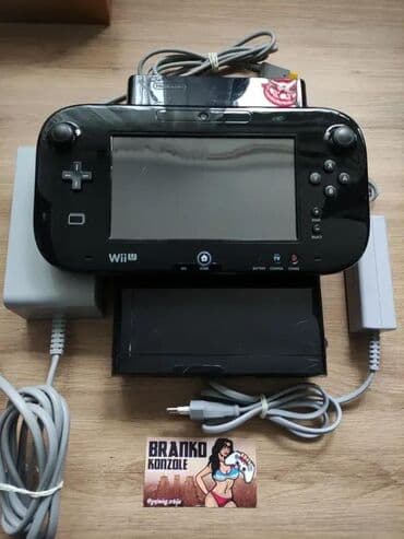 **SNIZENO** Prodajem crnu Nintendo Wii U konzolu 32gb + 128gb na lalafo.rs **SNIZENO** Prodajem crnu Nintendo Wii U konzolu 32gb + 128gb