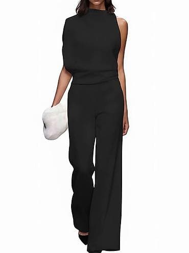 Elegantni crni ženski kombinezon - Fazonski široke nogavice za na lalafo.rs Elegantni crni ženski kombinezon - Fazonski široke nogavice za