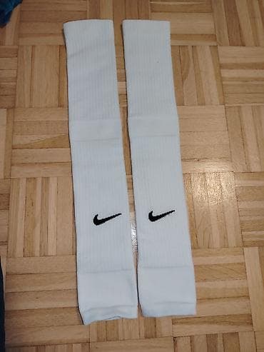 Bele sportske štucne Nike - Model: duge sportske štucne do kolena - na lalafo.rs — 1 Bele sportske štucne Nike - Model: duge sportske štucne do kolena - — 1