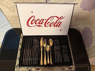 Ekskluzivni Coca‑Cola set pribora za jelo u poklon kutiji. - na lalafo.rs — 1 Ekskluzivni Coca‑Cola set pribora za jelo u poklon kutiji. - — 1