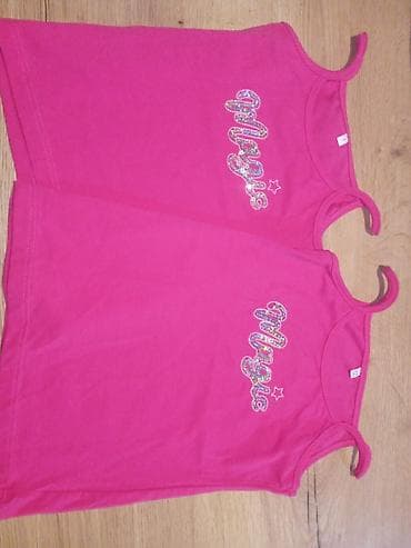 Dve dečije majice bez rukava u jarkoj pink boji. Na prednjoj strani na lalafo.rs — 1 Dve dečije majice bez rukava u jarkoj pink boji. Na prednjoj strani — 1