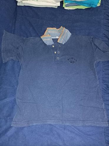 Na prodaju plava polo majica za uzrast 5-6 godina, u super stanju na lalafo.rs — 2 Na prodaju plava polo majica za uzrast 5-6 godina, u super stanju — 2