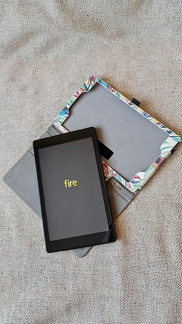 Amazon Fire tablet sa zaštitnom futrolom na preklop - Ekran oko 7–8 na lalafo.rs — 8 Amazon Fire tablet sa zaštitnom futrolom na preklop - Ekran oko 7–8 — 8