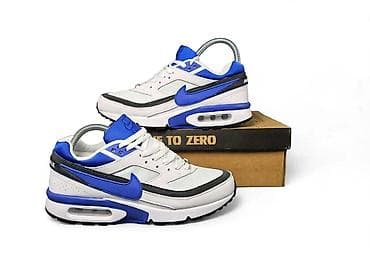 Nike Air Max patike – bele sa plavim i crnim detaljima - Model sa na lalafo.rs Nike Air Max patike – bele sa plavim i crnim detaljima - Model sa