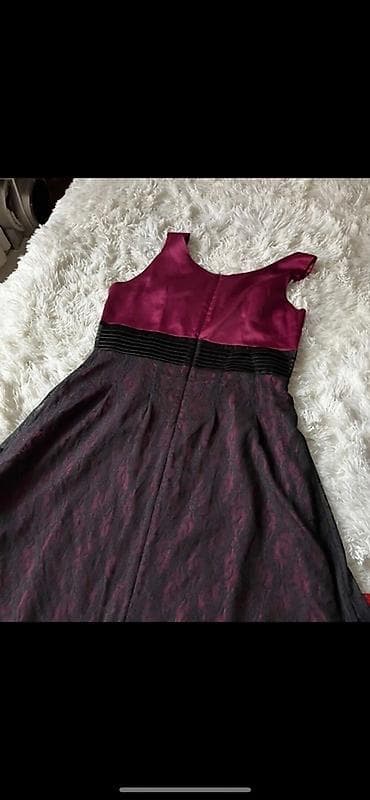 Velicina 40.Elegantna ženska haljina bez rukava, midi dužine. Gornji na lalafo.rs — 2 Velicina 40.Elegantna ženska haljina bez rukava, midi dužine. Gornji — 2