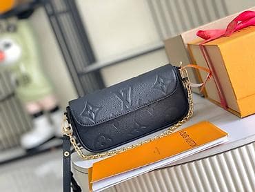 dve suknje po: Crna kožna torbica sa reljefnim Monogram uzorkom. Kompaktnog na lalafo.rs — 1 dve suknje po: Crna kožna torbica sa reljefnim Monogram uzorkom. Kompaktnog — 1