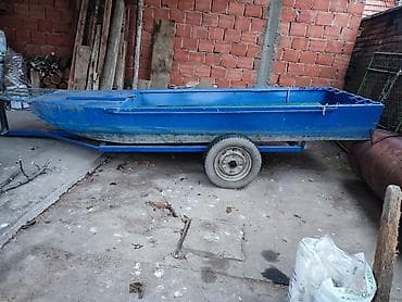 Na prodaju čamac sa prikolicom. Dužina čamca je 4m. Širina 1,2m na lalafo.rs Na prodaju čamac sa prikolicom. Dužina čamca je 4m. Širina 1,2m