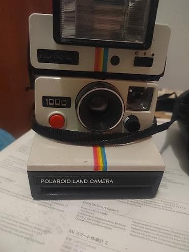 Polaroid Land Camera 1000 sa Polatronic 1 blicem - Klasični instant at lalafo.rs — 1 Polaroid Land Camera 1000 sa Polatronic 1 blicem - Klasični instant — 1