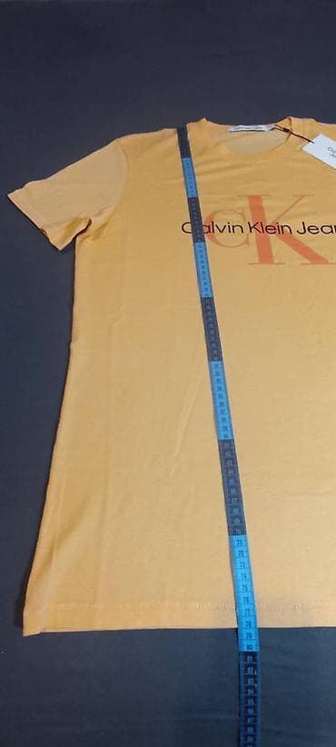 Calvin Klein Jeans narandžasta majica XXL 2390din,nova, original - na lalafo.rs — 5 Calvin Klein Jeans narandžasta majica XXL 2390din,nova, original - — 5