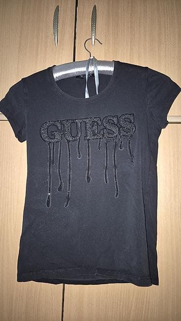 GUESS ženska majica kratkih rukava, crna. - Model: klasičan T‑shirt na lalafo.rs — 1 GUESS ženska majica kratkih rukava, crna. - Model: klasičan T‑shirt — 1