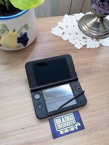 🎮 Nintendo 3DS XL – odlično stanje 📌 Konzola sa slika je siva na lalafo.rs — 1 🎮 Nintendo 3DS XL – odlično stanje 📌 Konzola sa slika je siva — 1