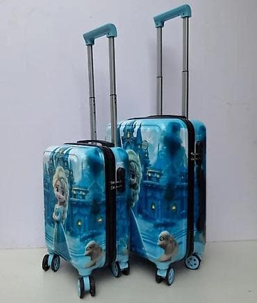 dve suknje po: Dečiji kofer na točkiće – motiv ledene princeze - Tvrda školjka sa at lalafo.rs — 5 dve suknje po: Dečiji kofer na točkiće – motiv ledene princeze - Tvrda školjka sa — 5