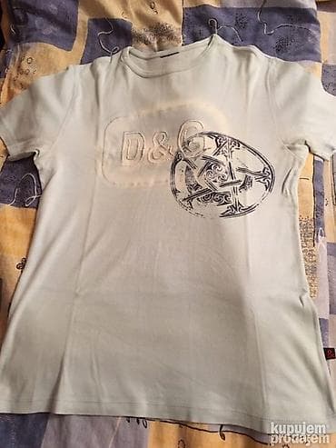 Svetlo plava bodi majca D&G, očuvana.Svetlo plava majca D&G na lalafo.rs — 8 Svetlo plava bodi majca D&G, očuvana.Svetlo plava majca D&G — 8