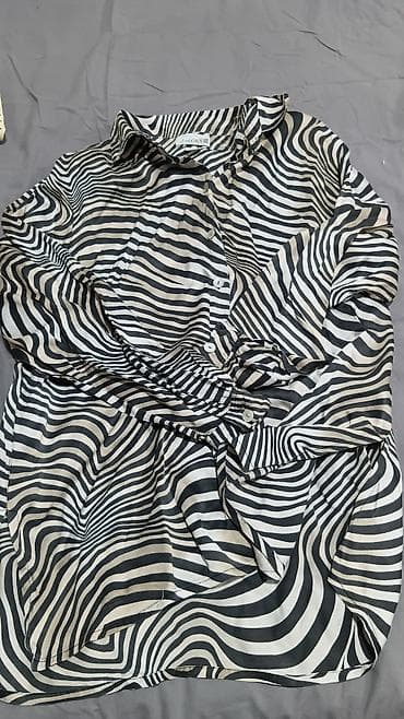 Set od 4 ženske košulje na dugmad, različitih dezena i krojeva: - na lalafo.rs Set od 4 ženske košulje na dugmad, različitih dezena i krojeva: -