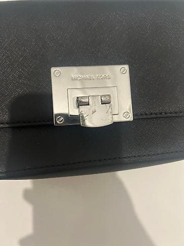 Michael Kors TINA SM Clutch – crna kožna torbica Uvoz Engleska Polovna at lalafo.rs — 1 Michael Kors TINA SM Clutch – crna kožna torbica Uvoz Engleska Polovna — 1
