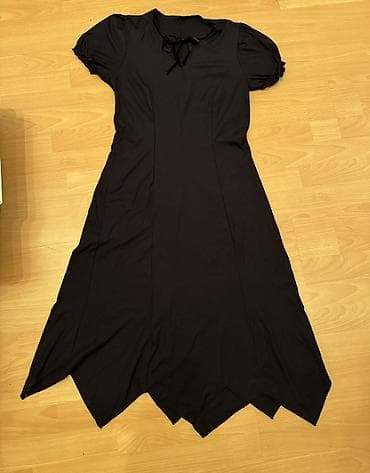 Haljina elasticna,interesantnog kroja.Elegantna na lalafo.rs Haljina elasticna,interesantnog kroja.Elegantna