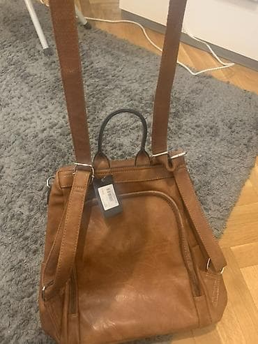 NOV Ženska torba/ruksak 2-u-1, karmel braon boje. - Materijal: 100% na lalafo.rs NOV Ženska torba/ruksak 2-u-1, karmel braon boje. - Materijal: 100%