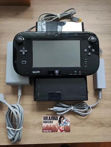 **SNIZENO** Prodajem crnu Nintendo Wii U konzolu 32gb + 128gb na lalafo.rs — 2 **SNIZENO** Prodajem crnu Nintendo Wii U konzolu 32gb + 128gb — 2