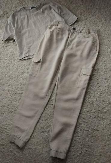 Cargo pantalone duboke tanke u kremkastoj puder boji dubokog struka sa na lalafo.rs — 1 Cargo pantalone duboke tanke u kremkastoj puder boji dubokog struka sa — 1