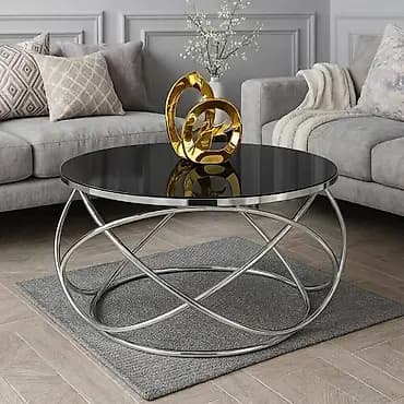 Moderan okrugli klub sto sa crnom staklenom pločom i skulpturalnom